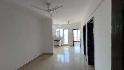 Living Room Image of 840 Sq.ft 2 BHK Apartment / Flat for rent in Aditya Urban Homes Phase 1A, Bamheta Village Ghaziabad for Rs. 12000