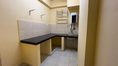 Kitchen Image of 1060 Sq.ft 3 BHK Apartment / Flat for rent in Srijan Greenfield City, Maheshtala Kolkata for Rs. 20000