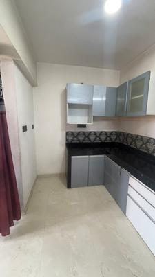 Kitchen Image of 706 Sq.ft 2 BHK Apartment / Flat for rent in Unique Prospero, Lohegaon Pune for Rs. 25000