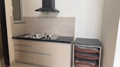 Kitchen Image of 990 Sq.ft 2 BHK Duplex for rent in Geras Planet Of Joy, Upper Kharadi Pune for Rs. 33000