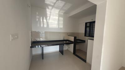 Kitchen Image of 950 Sq.ft 2 BHK Apartment / Flat for rent in Kohinoor Sportsville, Maan Pune for Rs. 26000