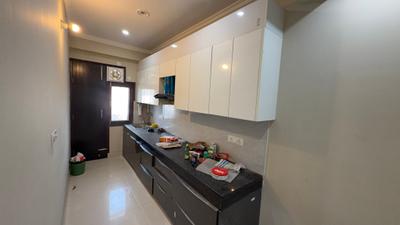 Kitchen Image of 950 Sq.ft 2 BHK Builder Floor for rent in Palam Vihar Extension Gurgaon for Rs. 25000