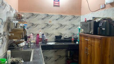 Kitchen Image of 400 Sq.ft 2 BHK Independent House for rent in Dwarka Mor New Delhi for Rs. 12000