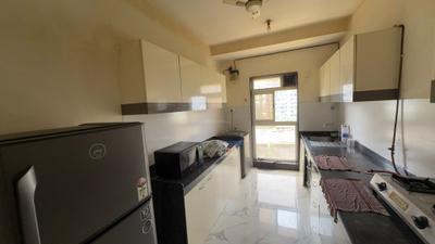 Kitchen Image of 1350 Sq.ft 3 BHK Apartment / Flat for rent in Raheja Ridgewood, Goregaon East Mumbai for Rs. 130000