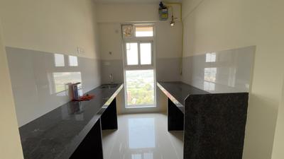 Kitchen Image of 700 Sq.ft 1 BHK Apartment / Flat for rent in Ashar Arize Tower B And C, Kalwa Thane for Rs. 30000