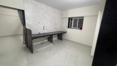 Kitchen Image of 950 Sq.ft 2 BHK Apartment / Flat for rent in JND Wisteria, Ambegaon Budruk Pune for Rs. 22000