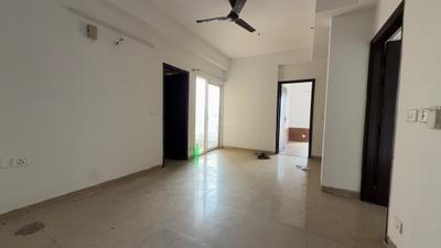 Living Room Image of 995 Sq.ft 2 BHK Apartment / Flat for sale in Ajnara Homes, Noida Extension Greater Noida for Rs. 8800000