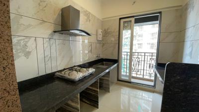 Kitchen Image of 1250 Sq.ft 2 BHK Apartment / Flat for sale in Paradise Sai World Empire, Kharghar Navi Mumbai for Rs. 20500000