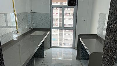 Kitchen Image of 700 Sq.ft 2 BHK Apartment / Flat for sale in Ashapura Zynergy, Chembur Mumbai for Rs. 16000000