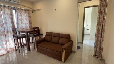 Living Room Image of 450 Sq.ft 1 BHK Apartment / Flat for rent in Ajmera Greenfinity, Wadala East Mumbai for Rs. 46000