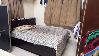 Bedroom Image of 850 Sq.ft 2 BHK Apartment / Flat for sale in Nilanjana CHS, Malad West Mumbai for Rs. 20000000