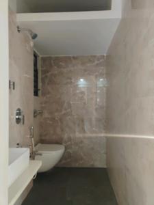 Common Bathroom Image of 670 Sq.ft 1 BHK Apartment / Flat for sale in Rajhans Moonstone, Vasai West Vasai for Rs. 6800000