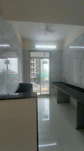 Kitchen Image of 670 Sq.ft 1 BHK Apartment / Flat for sale in Mohan Alcoves I, Badlapur West Badlapur for Rs. 2699000
