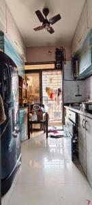 Kitchen Image of 600 Sq.ft 1 BHK Apartment / Flat for sale in Om Prabhu Manohar CHS, Seawoods Navi Mumbai for Rs. 12500000