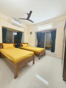 Bedroom Image of HelloWorld Pride Stay in New Town, Kolkata