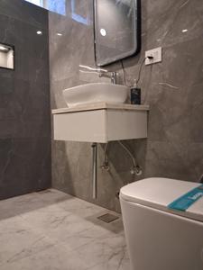 Common Bathroom Image of 1120 Sq.ft 2 BHK Apartment / Flat for sale in Sector 89 Noida for Rs. 5600000