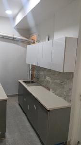 Kitchen Image of 1205 Sq.ft 3 BHK Builder Floor for rent in Signature Global City 92, Sector 92 Gurgaon for Rs. 27500