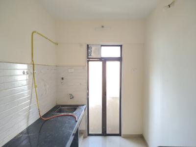 Kitchen Image of 700 Sq.ft 1 BHK Apartment / Flat for rent in Raunak Bliss, Kasarvadavali Thane for Rs. 16000