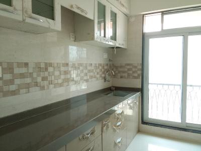 Kitchen Image of 708 Sq.ft 1 BHK Apartment / Flat for sale in National Sea Queen Park, Taloja Navi Mumbai for Rs. 3700000