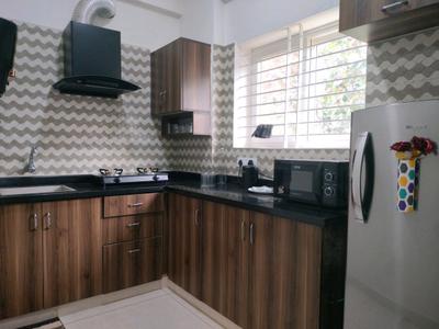 Kitchen Image of 1100 Sq.ft 2 BHK Independent House for rent in Domlur Layout Bengaluru for Rs. 80000
