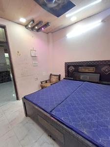 Bedroom Image of 700 Sq.ft 2 BHK Builder Floor for rent in Sarvdharm RWA, Mukherjee Nagar New Delhi for Rs. 22000