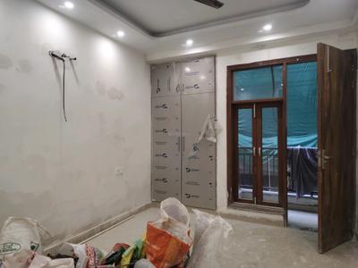 Bedroom Image of 1000 Sq.ft 2 BHK Builder Floor for rent in Murari Sharma, Rajpur Khurd Village New Delhi for Rs. 23000