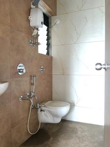 Common Bathroom Image of 950 Sq.ft 2 BHK Apartment / Flat for sale in Raunak Unnathi Woods Phase VI F2, Kasarvadavali Thane for Rs. 9000000