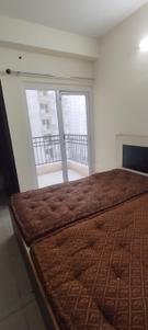 Bedroom Image of 995 Sq.ft 2 BHK Apartment / Flat for sale in Ajnara Le Garden, Noida Extension Greater Noida for Rs. 7950000