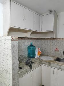 Kitchen Image of 410 Sq.ft 1 RK Studio for rent in Varun Enclave, Sector 28 Noida for Rs. 13000
