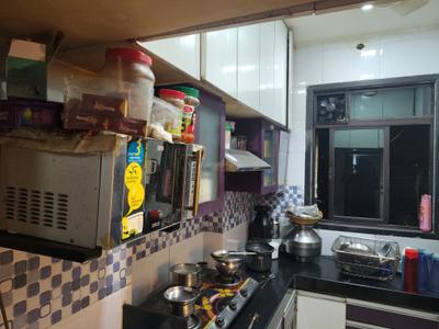 Kitchen Image of 545 Sq.ft 2 BHK Apartment / Flat for rent in Raunak Unnathi Woods, Kasarvadavali Thane for Rs. 24999