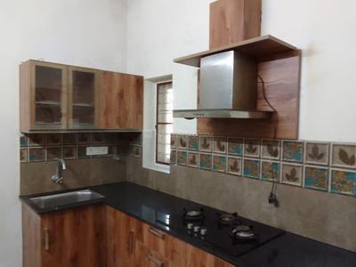 Kitchen Image of 1300 Sq.ft 3 BHK Independent House for rent in Panangad Kochi for Rs. 24000