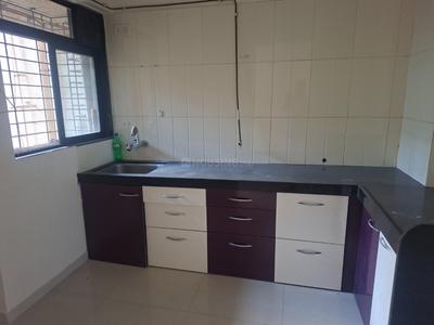 Kitchen Image of 952 Sq.ft 2 BHK Apartment / Flat for sale in Raunak Unnathi Woods Phase 3, Kasarvadavali Thane for Rs. 8500000