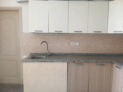 Kitchen Image of 1100 Sq.ft 2 BHK Apartment / Flat for rent in Raheja Vedaanta, Sector 108 Gurgaon for Rs. 35000