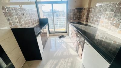 Kitchen Image of 775 Sq.ft 1 BHK Apartment / Flat for rent in Shree Chamunda Garden, Thakurli Thane for Rs. 16000