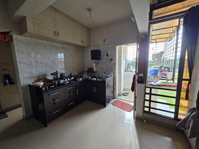 Kitchen Image of 912 Sq.ft 2 BHK Apartment / Flat for sale in  Shubh Enclave, Vadsar Vadodara for Rs. 2300000