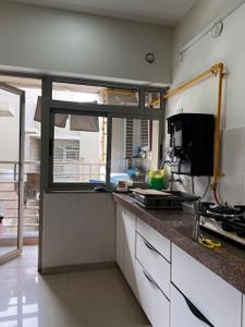 Kitchen Image of 1080 Sq.ft 2 BHK Apartment / Flat for rent in Adani The Meadows, Shantigram Ahmedabad for Rs. 35000