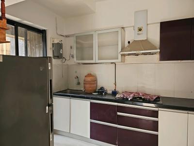 Kitchen Image of 884 Sq.ft 1.5 BHK Apartment / Flat for sale in Long Island, Charholi Budruk Pune for Rs. 5200000