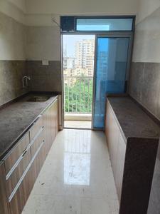 Kitchen Image of 720 Sq.ft 1 BHK Apartment / Flat for sale in Krishna Ultima, Kalyan East Kalyan for Rs. 4100000