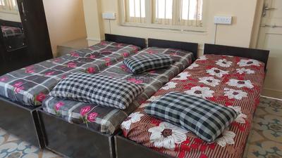 Bedroom Image of KRISHNA PG in Gurukul, Ahmedabad