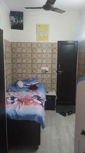Bedroom Image of EVERGREEN HOME PG in Ramesh Nagar, New Delhi