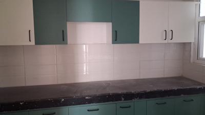 Kitchen Image of 1050 Sq.ft 2 BHK Apartment / Flat for rent in Shri Radha Aqua Garden, Noida Extension Greater Noida for Rs. 20000