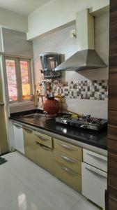Kitchen Image of 765 Sq.ft 2 BHK Apartment / Flat for sale in Shafalya Shlok Parisar, Gota Ahmedabad for Rs. 7300000