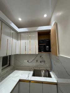 Kitchen Image of 650 Sq.ft 2 BHK Builder Floor for rent in S Gambhir Homes, Dwarka Mor New Delhi for Rs. 21900