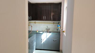 Kitchen Image of 950 Sq.ft 2 BHK Apartment / Flat for rent in Jaypee Kosmos, Sector 134 Noida for Rs. 23000