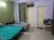 Bedroom Image of Kartik Girls Hostel in Sector 17, Gurgaon