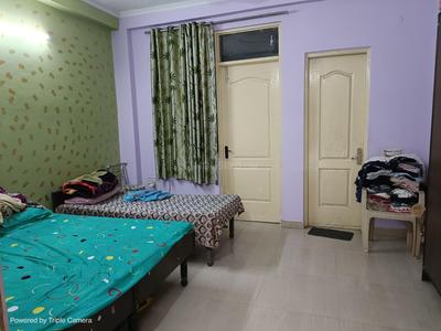 Bedroom Image of Kartik Girls Hostel in Sector 17, Gurgaon
