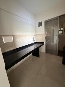 Kitchen Image of 905 Sq.ft 2 BHK Apartment / Flat for sale in Venkatesh Oxy Ultima, Wagholi Pune for Rs. 5400000