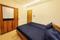 Bedroom Image of HelloWorld Houston in Vastrapur, Ahmedabad