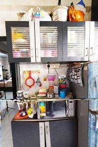 Kitchen Image of 990 Sq.ft 2 BHK Apartment / Flat for sale in Adalaj Gandhinagar for Rs. 4800000