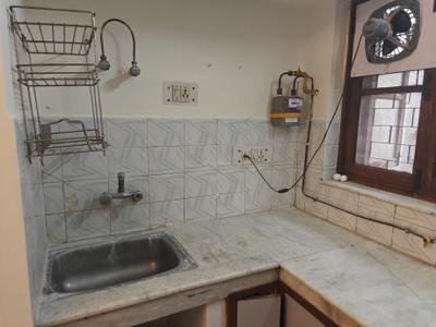 Kitchen Image of 1500 Sq.ft 1 BHK Builder Floor for rent in Greater Kailash II New Delhi for Rs. 43000